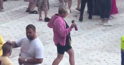 Moment 'hysterical' Pink fan breaks into dance during concert