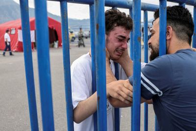 Search for loved ones, truth in Greece after migrant boat tragedy