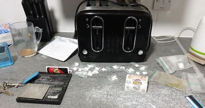 Man arrested after thousands in cash, Class A drugs and multiple mobile phones seized from home