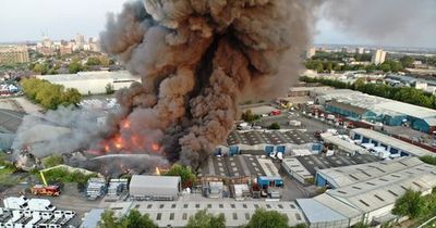 Manchester fire: Enormous plume of smoke billows into sky as locals urged to shut windows