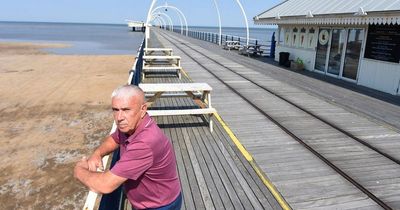 Cafe owner feels like 'he's in an apocalypse' after business stranded on closed pier