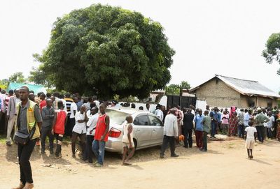 At least 38 children dead and others abducted in attack on Uganda school by Isis-linked group