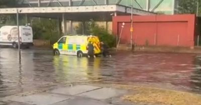 Glasgow flash floods cause chaos on roads as ambulance pushed to safety