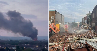 Firefighters tackle early hours huge blaze which tore through industrial estate and filled sky with smoke