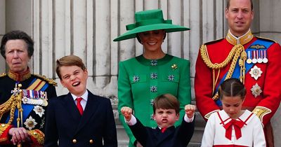 King thanks Trooping crowds from palace balcony as young Louis steals show