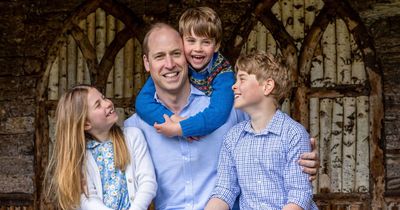Smiling Prince William and Cambridge kids sparkle in blue for sweet Father's Day photo