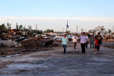 Texas town hit by tornado that killed three braced for more damage as high winds and hailstorms forecast