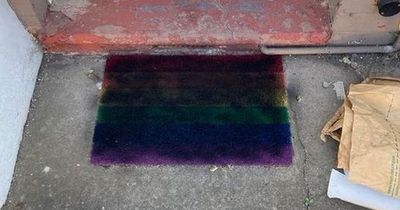 Gay couple's rainbow doormat vandalised during Pride before entire street shows support