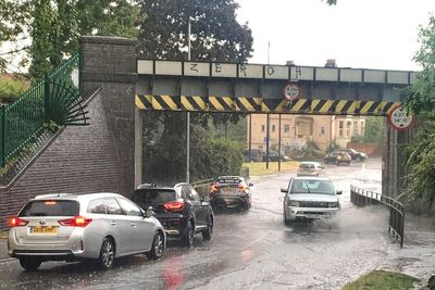 Flood warnings in place after nearly half a month of rain falls in one hour