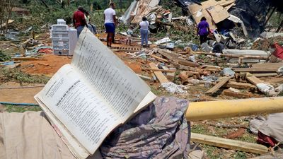 "Blistering" heat wave fuels deadly storms and power outages across southern U.S.