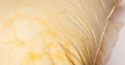 Yellow pillow stains removed by 65p cleaning hack that transforms discolouring