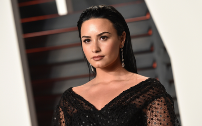 Demi Lovato nails the mid-century look in her dining room – and we're buying into it