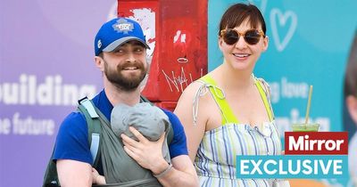 Daniel Radcliffe and partner Erin Darke all smiles as they show off new baby in New York