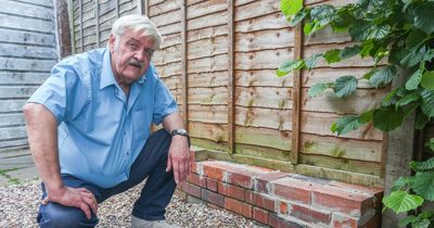 Pensioner barricaded in his own home after bungling workmen dig trench in his garden