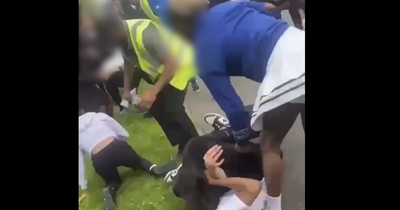 Footage of huge brawl at Leeds school as screaming pupil smacked with rolling pin by mum in cheerleader outfit