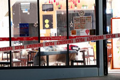 4 wounded after man with axe attacks diners at 3 New Zealand restaurants