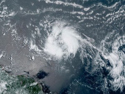 Tropical storm Bret – update: Hurricane forecast downgraded but Caribbean remains on alert