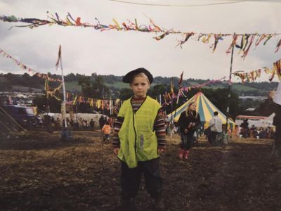 The earthy magic and lawless energy of being a child at Glastonbury festival
