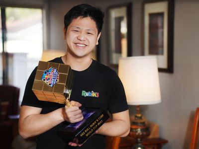 He once had motor skill challenges. Now he's the world's fastest Rubik's cube solver