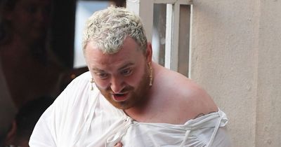 Sam Smith lifts up sheer dress to give pals a peek at underwear in New York