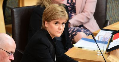 Nicola Sturgeon insists she has 'done nothing wrong' as she returns to Holyrood after arrest