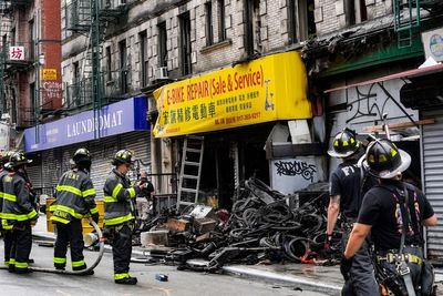 4 dead after fire in e-bike shop spreads to apartments in New York City