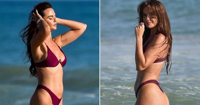 Jennifer Metcalfe shows off her abs in tiny bikini as she makes a splash on the beach