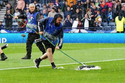 Scotland vs Georgia suspended after heavy rain as water swept off pitch