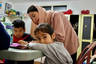 In limbo in Indonesia, Afghan women find they ‘can be a boss’