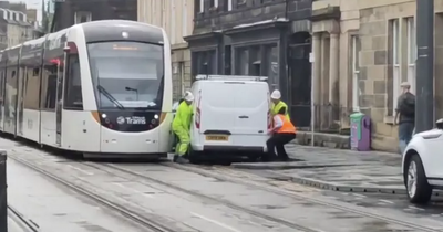 Viral video shows Edinburgh workmen trying to lift parked van blocking tram tracks