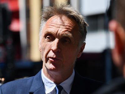 Olympic champ Brooks and wife to face fraud trial