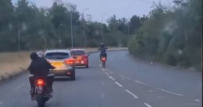 Reckless Edinburgh youth on off-road bike passes learner driver while pulling stunt