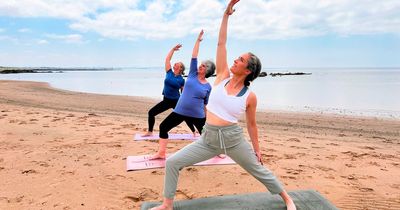 Limber up for beach yoga experience at Ayrshire coastal hotel this summer