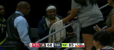 Arike Ogunbowale hilariously signed an autograph on her way to locker room after being ejected