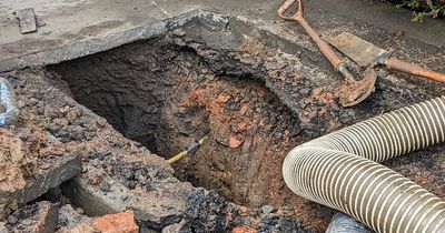 Huge hole as burst pipe in Bearsden causes water loss for residents after adverse weather