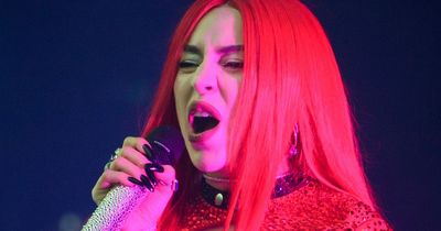 Ava Max 'slapped so hard' by fan on stage that 'the inside of her eye is scratched'