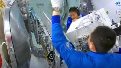 Chinese astronauts install radiation-exposure experiment outside Tiangong space station (video)