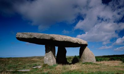 ‘It stands over us like a giant’s dining table’: on the trail of the UK’s ancient stones