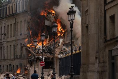 Explosion hits a building in Paris, injuring four people. Police are trying to determine the cause