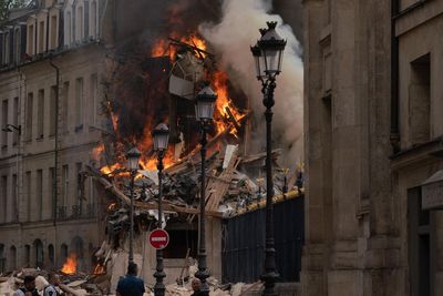 Paris explosion - live: Two missing people feared buried in rubble after blast in US fashion school