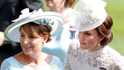 We're obsessed with Carole Middleton's thick 80s bangs in this old photo of her as a new mom with newborn Princess Catherine