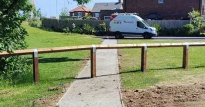 Residents ridicule fence built over path - and no one knows who put it there