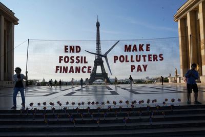 World leaders, activists in Paris seek financial response to climate emergency, poverty