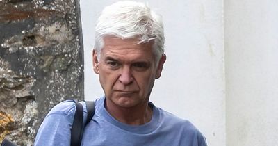 Glum Phillip Schofield clutches vape as he emerges from Cornish bolthole after weeks in hiding