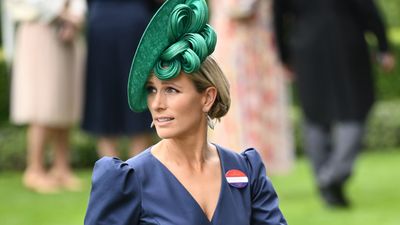 Zara Tindall is the picture of elegance in royal blue puff-sleeve dress and stunning silver heels at Ascot 2023