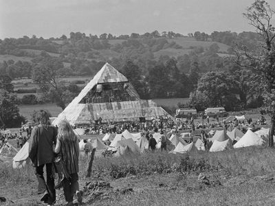 Free milk, £1 camping and political protests: Glastonbury through the years, in pictures