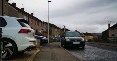 Council orders woman to extend 'tight fit' driveway to stop car overhanging