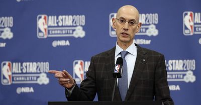 Why do fans boo NBA commissioner Adam Silver during the NBA Draft?