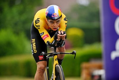 Wout van Aert wins Belgian time trial title as Remco Evenepoel crashes