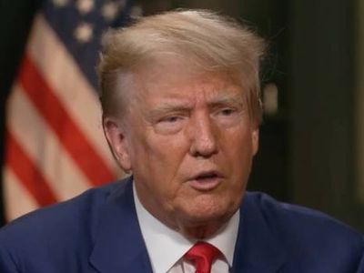 FBI analyst sentenced to four years over classified paper case that echoes Trump’s